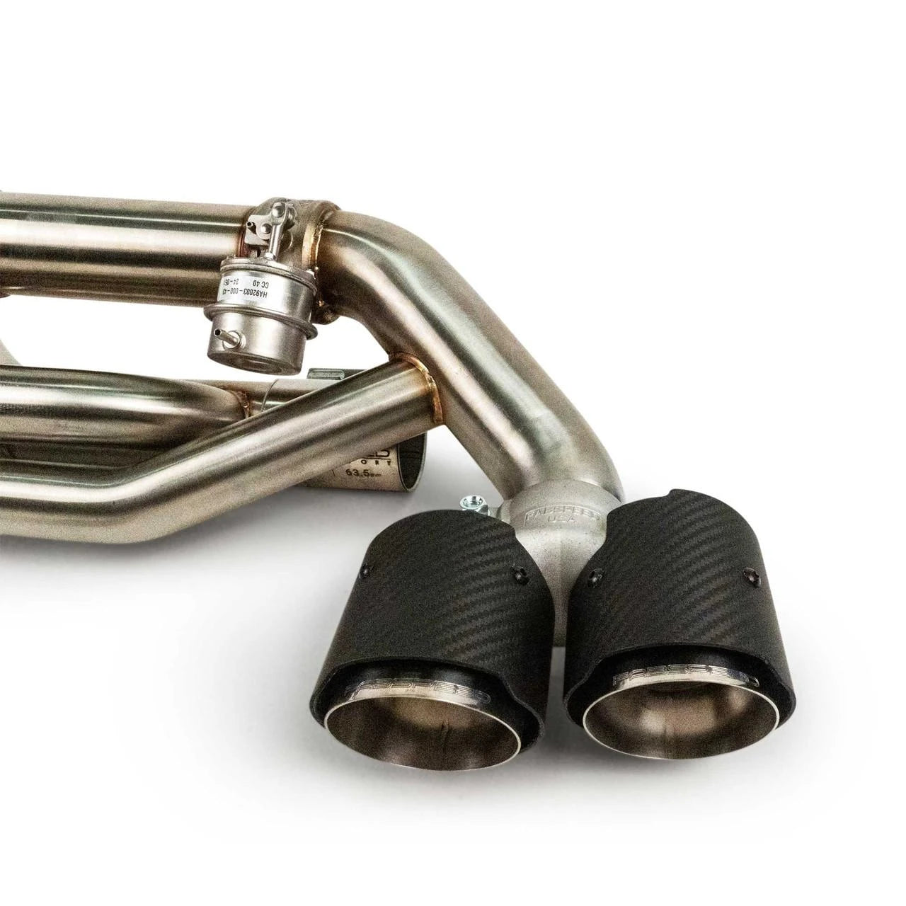 Carbon fiber tips on the Fabspeed 991.2 muffler bypass, left side