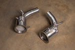 Valvetronic Designs 400 Cell Downpipes Porsche 992 Turbo / S manufacturer gallery: pair of downpipes laid diagonally with their inlet flanges visible