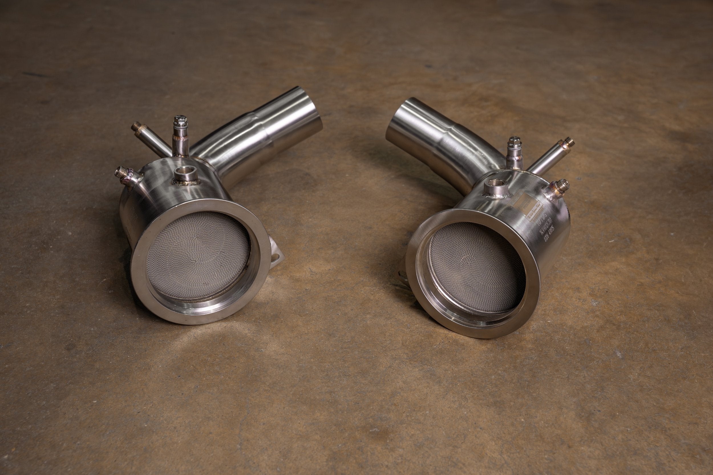 Valvetronic Designs 400 Cell Downpipes Porsche 992 Turbo / S manufacturer gallery: pair of downpipes with internal mesh visible in both openings