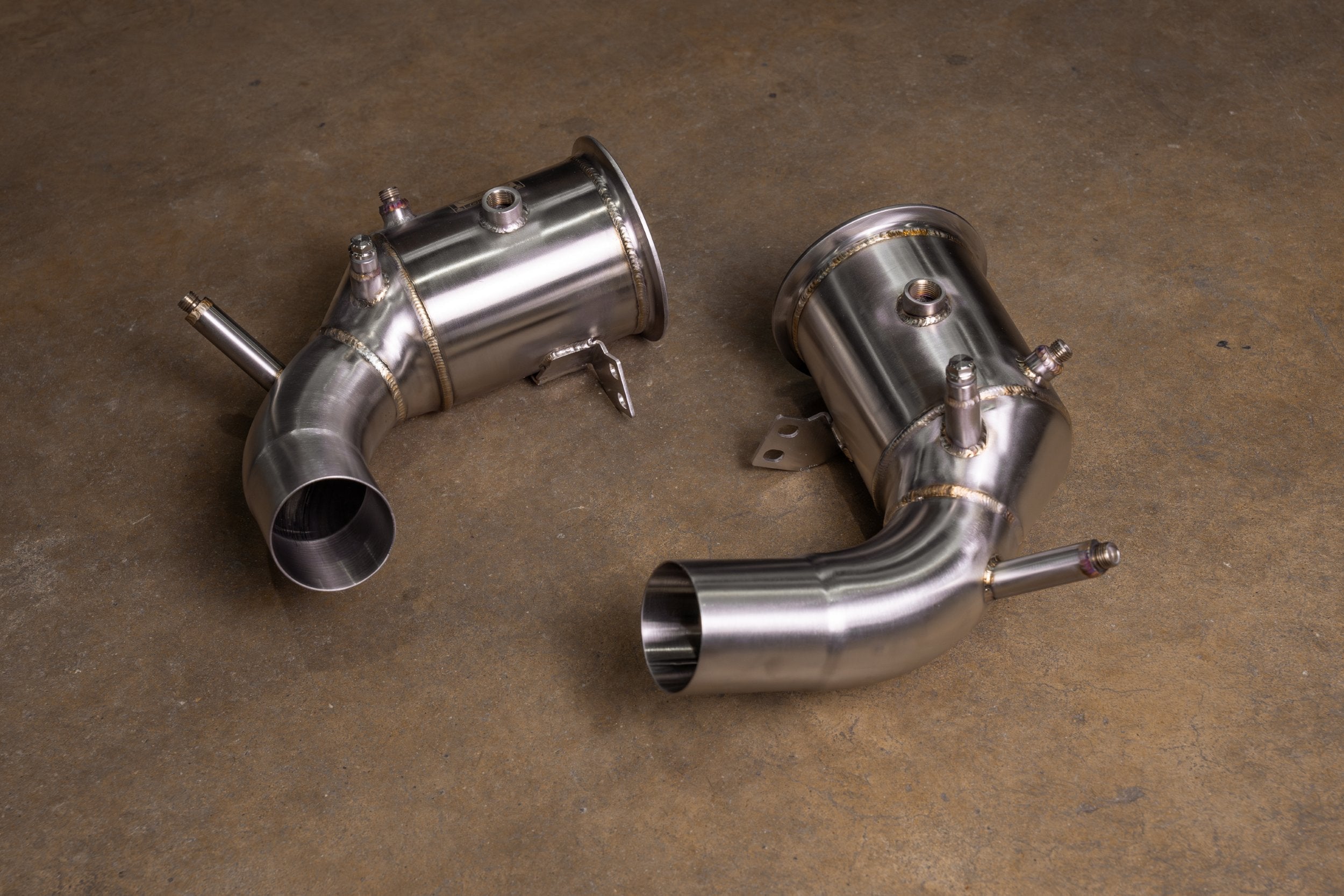 Valvetronic Designs 400 Cell Downpipes Porsche 992 Turbo / S manufacturer gallery: pair of downpipes viewed from the curved outlet side