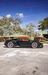 Black Lamborghini Aventador S side profile with carbon side skirts