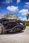 Black Aventador S low rear corner showing the carbon diffuser