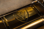 Valvetronic Designs Valved Exhaust BMW G90 M5 manufacturer gallery: embossed shield on the gold-toned rear muffler
