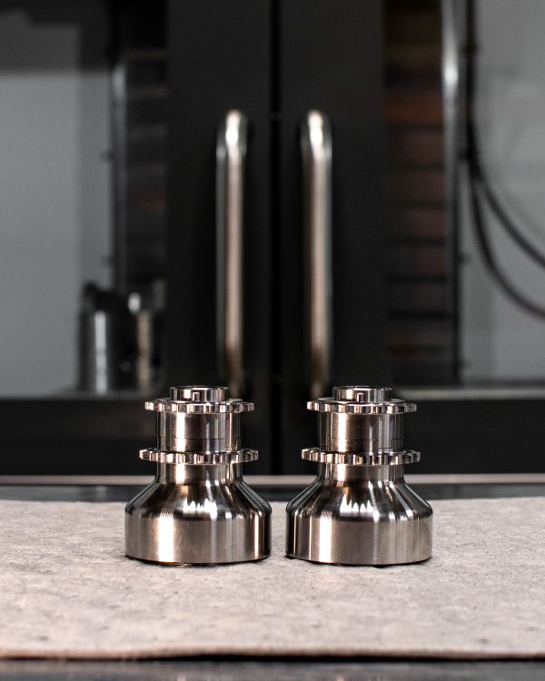 A front view of RK Autowerks S55 BILLET PINNED CRANK HUB on a table