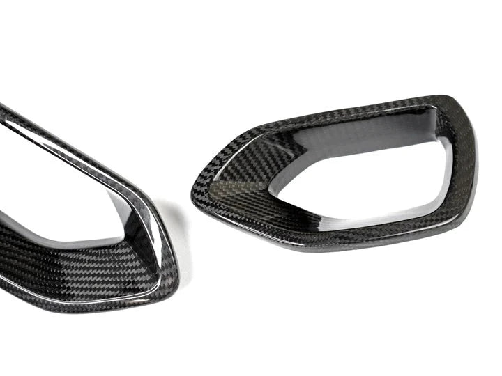 A close up view of AUTOTECKNIC DRY CARBON GRILLE SNORKEL SET - DODGE CHARGER SRT SCAT PACK 2015-2021 with white background