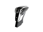 A front view of AUTOTECKNIC CARBON FIBER EXCLUSIVE DESIGN SHIFT LEVER for Porsche Models with white background