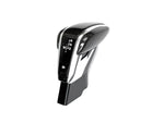 A front view of AUTOTECKNIC CARBON FIBER EXCLUSIVE DESIGN SHIFT LEVER for Porsche Models with white background