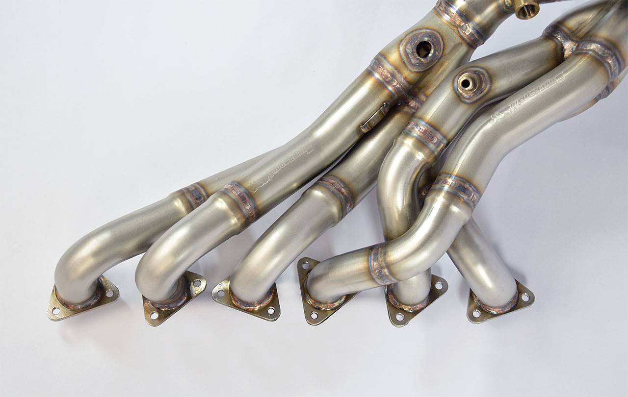 close top view of Supersprint Manifold - Step Design (Left Hand Drive) for BMW Z4 M Roadster / Coupè 3.2i 2006-2008 with white background