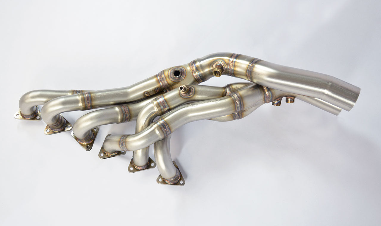wide top view of Supersprint Manifold - Step Design (Left Hand Drive) for BMW Z4 M Roadster / Coupè 3.2i 2006-2008 with white background