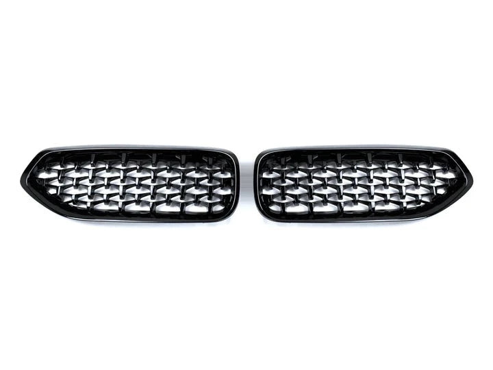 A front view of AUTOTECKNIC PAINTED GLAZING BLACK FRONT GRILLE SET - BMW G29 Z4 2018+ with white background