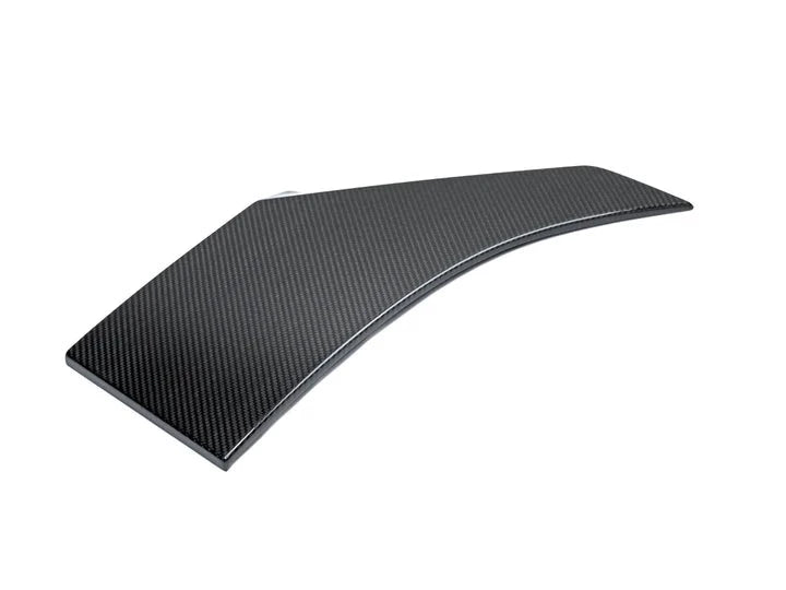A top view of AUTOTECKNIC DRY CARBON FIBER FENDER TRIM SET - BMW G06 X6 2020+ with white background