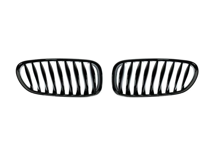 A front view of AUTOTECKNIC GLAZING BLACK FRONT GRILLE SET - E85 Z4 / Z4M 2002-2008 with white background