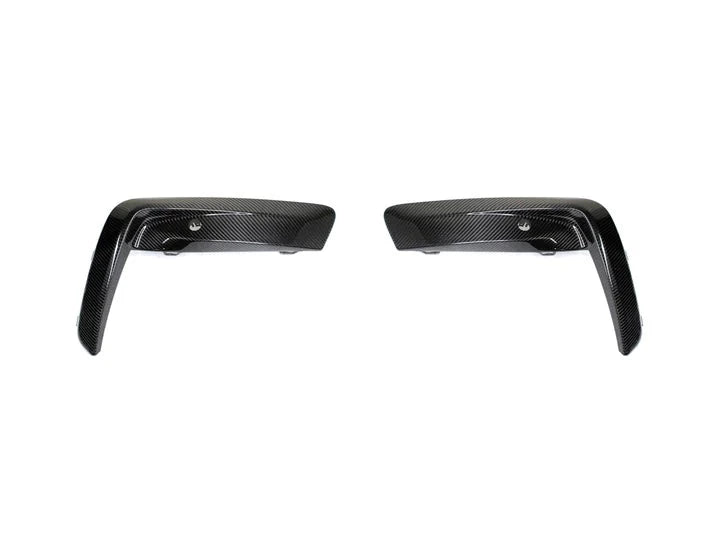 A front view of AUTOTECKNIC PERFORMANCE DRY CARBON BUMPER TRIM SET - BMW F9X M8 2019+ with white background