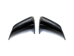 A side wide view of AUTOTECKNIC DRY CARBON FIBER MIRROR COVERS - TESLA MODEL Y 2020+ with white background