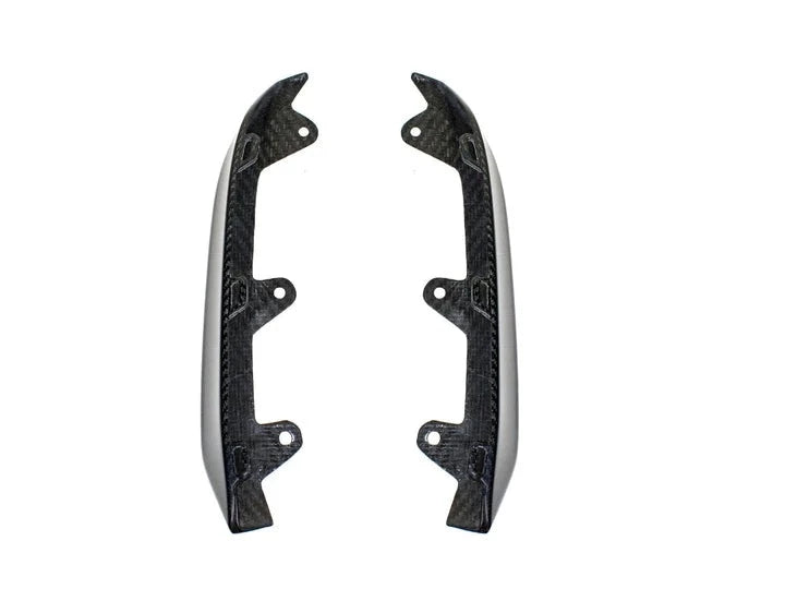 A front view of AUTOTECKNIC PERFORMANCE DRY CARBON SPLITTER SET - BMW F9X M8 2019+ with white background