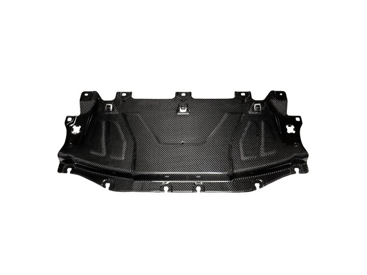 A front view of AUTOTECKNIC DRY CARBON FIBER COOLING PLATE - TOYOTA A90 SUPRA 2020+ with white background