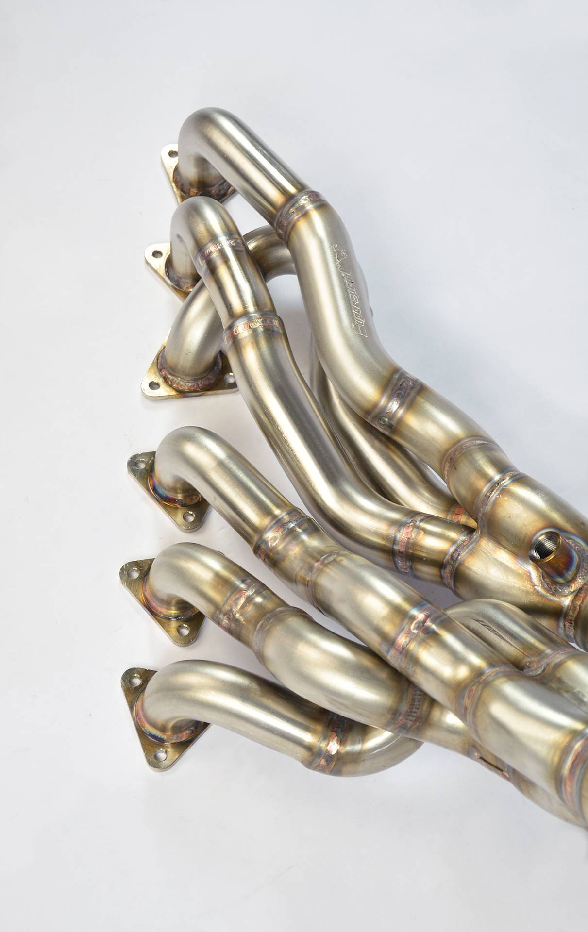 close top view of Supersprint Manifold "Step Design" (Replaces OEM catalytic converter) (Left / Right Hand Drive) for BMW E46 M3 3.2i Coupé/Cabrio 2001-2006 (USA Model Ø60mm - Single Pipe) with white background