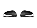 A front view of AUTOTECKNIC REPLACEMENT VERSION II DRY CARBON MIRROR COVERS - MERCEDES-BENZ W257 CLS-CLASS 2022+with white background