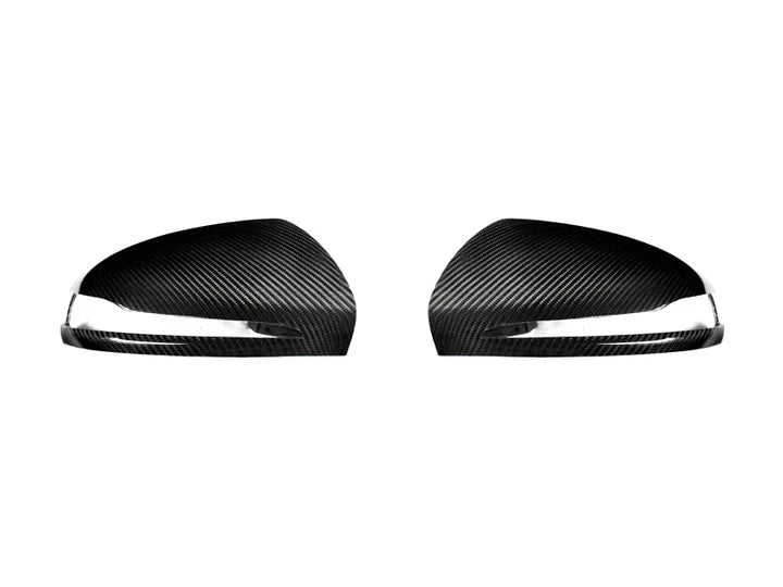 A front view of AUTOTECKNIC REPLACEMENT VERSION II DRY CARBON MIRROR COVERS - MERCEDES-BENZ H247 GLA-CLASS 2020+ with white background