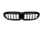 A front view of AUTOTECKNIC DUAL-SLATS GLAZING BLACK FRONT GRILLES - BMW G20 3-SERIES 2018+ with white background