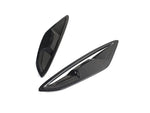 A front view of AUTOTECKNIC DRY CARBON FIBER FENDER TRIM SET - BMW G14/ G15/ G16 8-SERIES 2019+ with white background