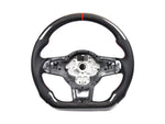 A front view of AUTOTECKNIC CARBON FIBER STEERING WHEEL - VW GLI | GTI | GOLF R 2015+ with white background