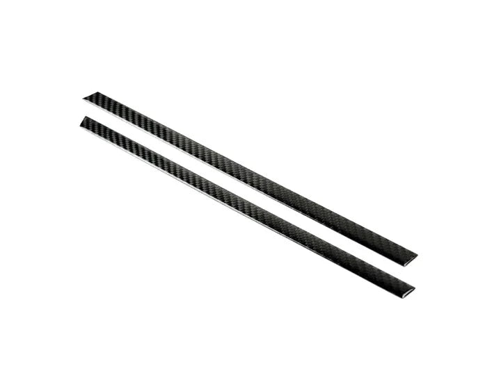 A front view of AUTOTECKNIC CARBON FIBER INTERIOR VENT TRIM - TOYOTA A90 SUPRA 2020+ with white background