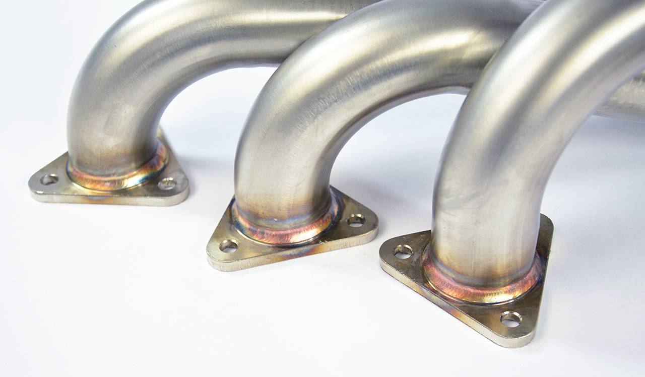 close top view of Supersprint Manifold (Replaces OEM catalytic converter) (Left Hand Drive) for BMW E46 M3 3.2i Coupé/Cabrio 2001-2006 with white background