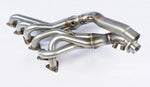 wide side view of Supersprint Manifold (Replaces OEM catalytic converter) (Left Hand Drive) for BMW E46 M3 3.2i Coupé/Cabrio 2001-2006 with white background