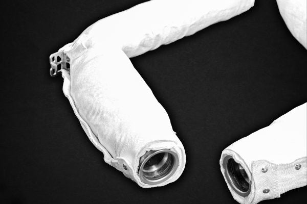 close view of Capristo Exhaust Catless Downpipes with Heat Blankets for Dodge Viper SRT ACR 2013-2017 with black background