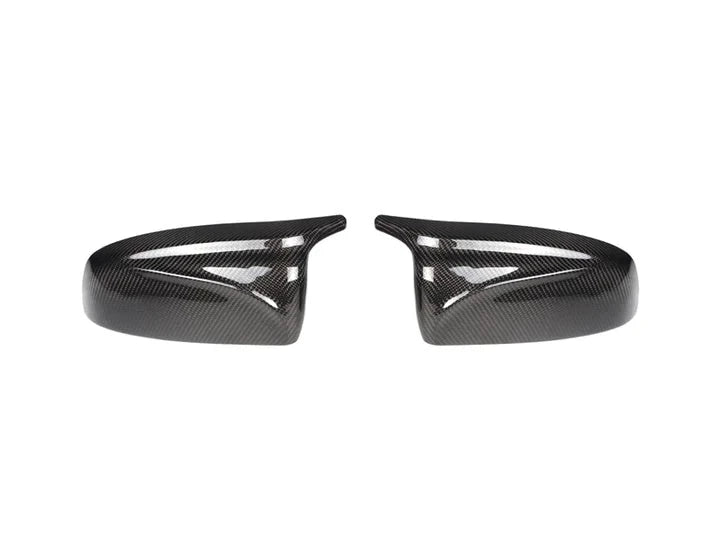 A front view of AUTOTECKNIC M-INSPIRED CARBON FIBER MIRROR COVERS - BMW E70 X5 | E71 X6 2006-2014 with white background