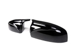 A side view of AUTOTECKNIC M-INSPIRED PAINTED MIRROR COVERS - BMW E70 X5 | E71 X6 2006-2014 with white background