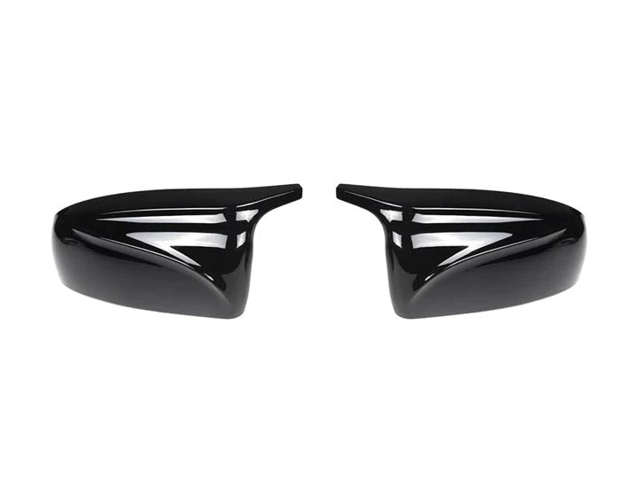 A front view of AUTOTECKNIC M-INSPIRED PAINTED MIRROR COVERS - BMW E70 X5 | E71 X6 2006-2014 with white background