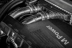 Carbon fiber charge pipes with metal clamps installed in BMW M3 engine bay - Eventuri charge pipes for BMW M3