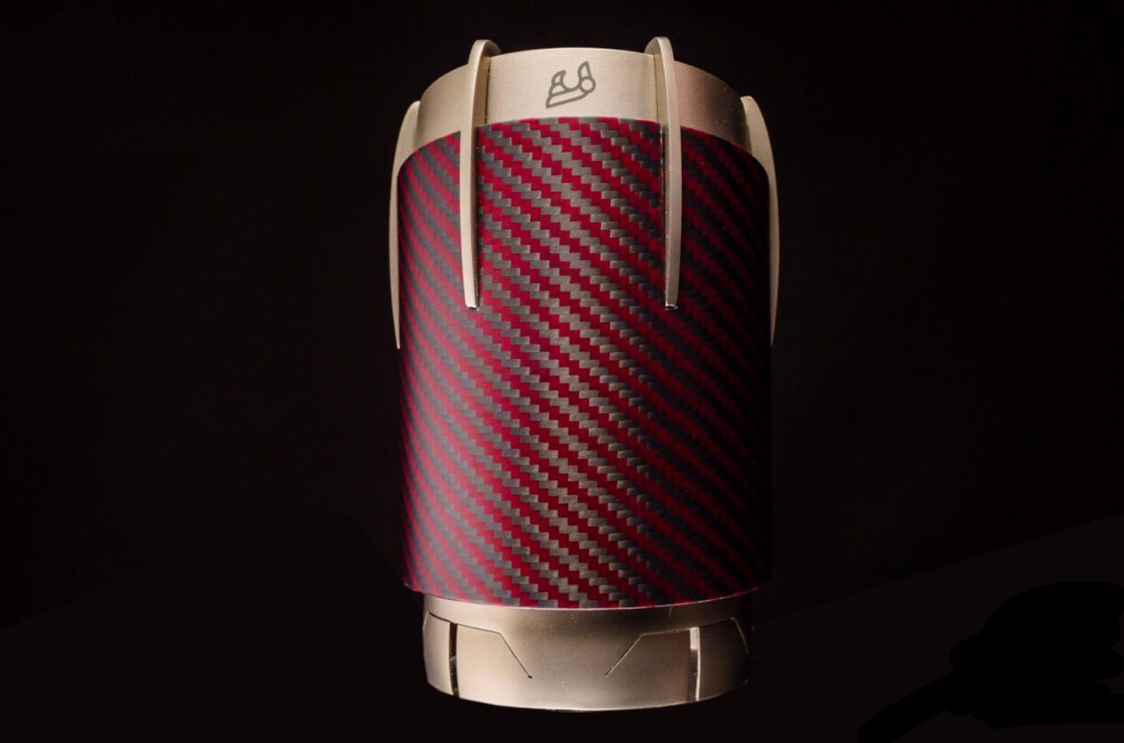 A front view of the red mamba carbon fiber tips of the IPE SS Dual Side Dual Out Version Cat-Back Exhaust System with OBDII with Lighting Sensor for Audi A6 C8 45 TFSI Quattro (2.0T) 2019+ with black background