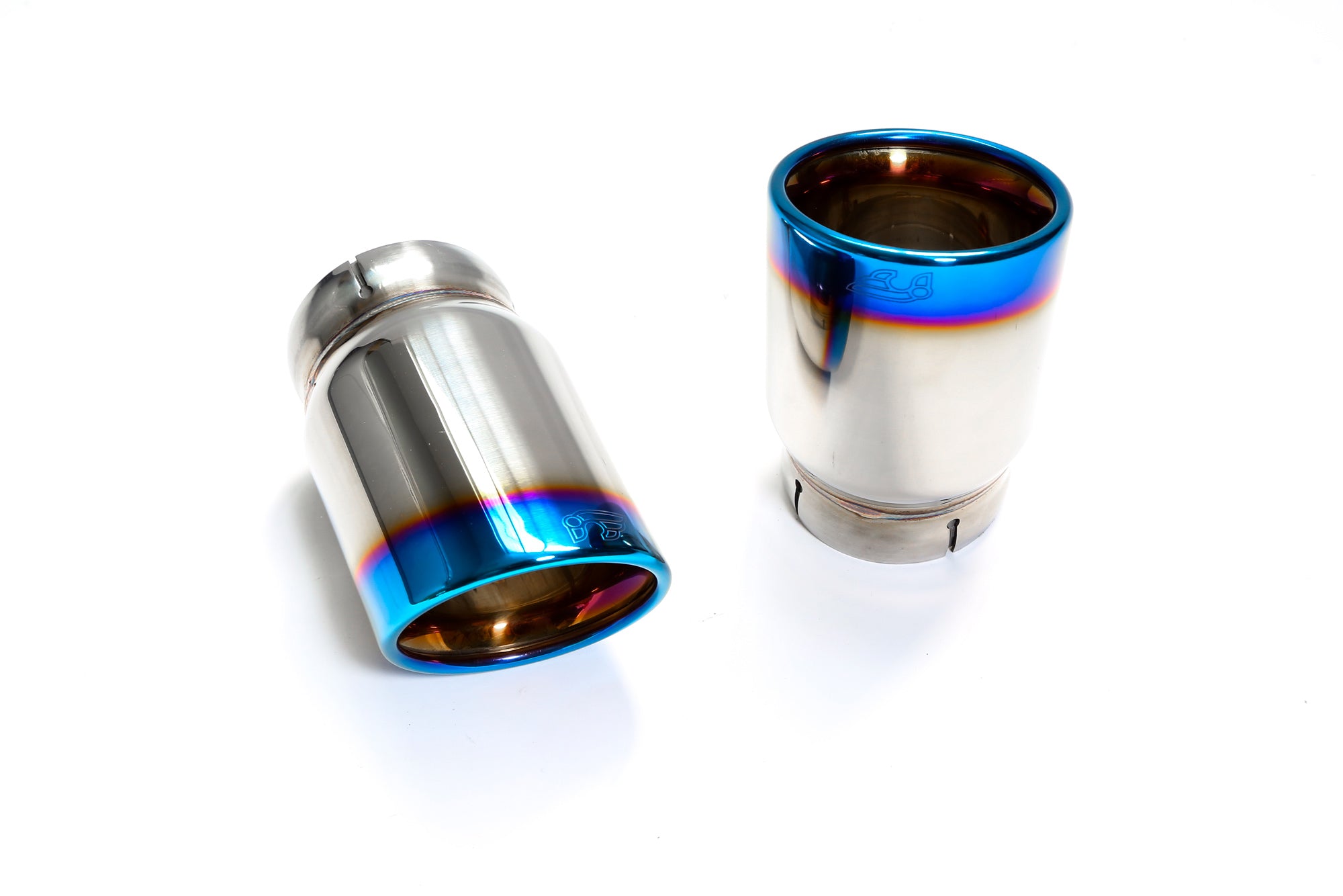 A front view of the titanium blue tips of the IPE SS Dual Side Dual Out Version Cat-Back Exhaust System with OBDII with Lighting Sensor for Audi A6 C8 45 TFSI Quattro (2.0T) 2019+ with white background