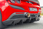 Rear corner of red Ferrari F8 with Capristo carbon fiber diffuser