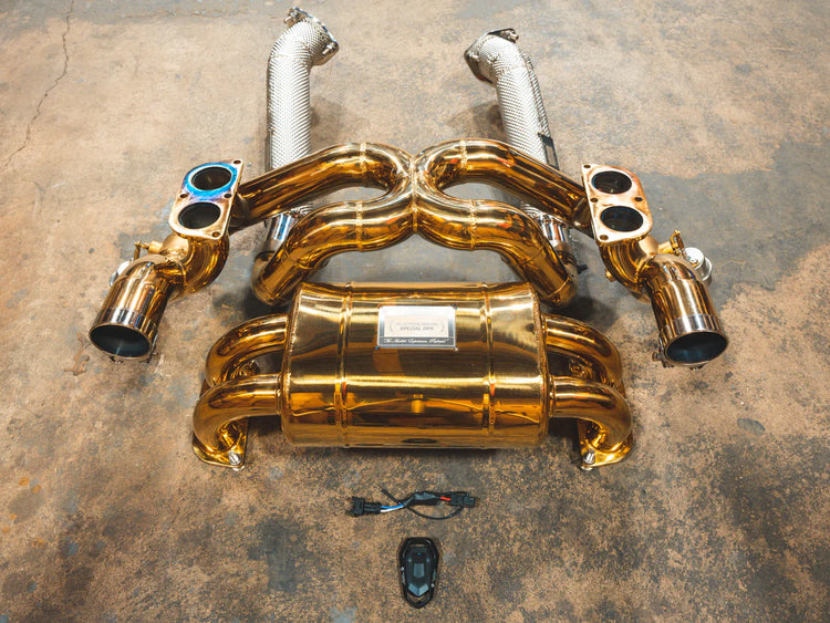 A top overview of Valvetronic Designs Valved Sport exhaust system on the ground (for Ferrari F430 Scuderia / 16M).