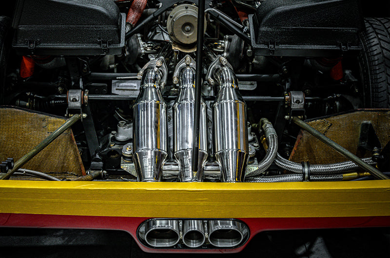 wide view of Capristo ECE Valved Catback Exhaust (CES3) for Ferrari F40 1987-1993 fitted in car