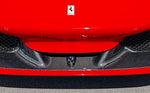 close view of Capristo Carbon Fiber Front Spoiler For Ferrari F8 2020-2022 fitted inside a red car