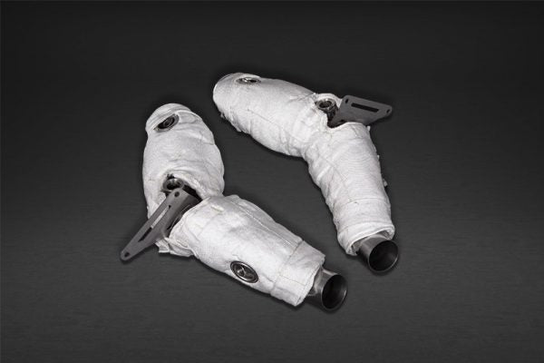 close view of Capristo Cat Delete Pipes (with Heat Blankets) for Ferrari F8 2019-2023 with grey background