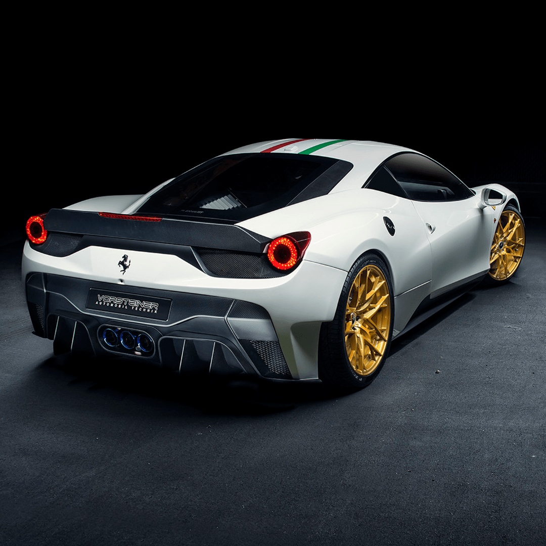 White 458 Italia with VX decklid spoiler, dark rear 3/4 of car