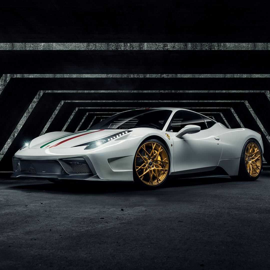 White 458 with VX front bumper, wide dark studio view