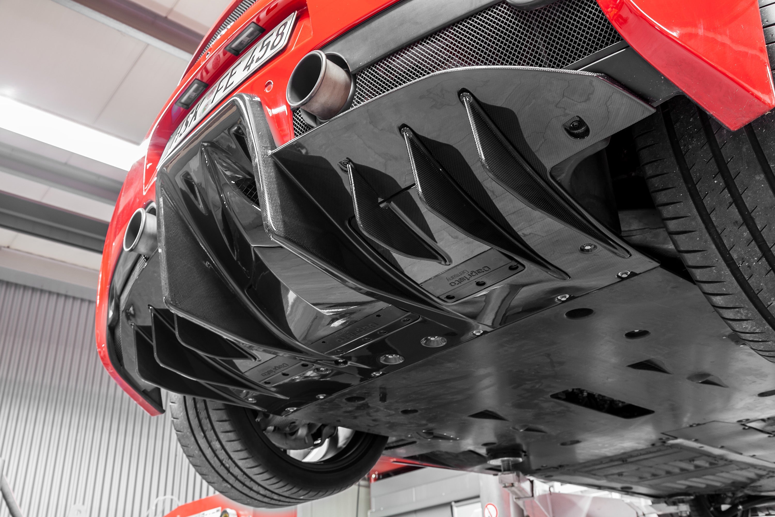Capristo carbon fiber rear diffuser on a Ferrari 458 Speciale, underside view