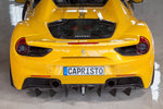Yellow Ferrari 488 rear view with Capristo carbon diffuser fins