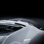 Carbon Diavolo decklid spoiler on Ferrari 488, dark studio close-up