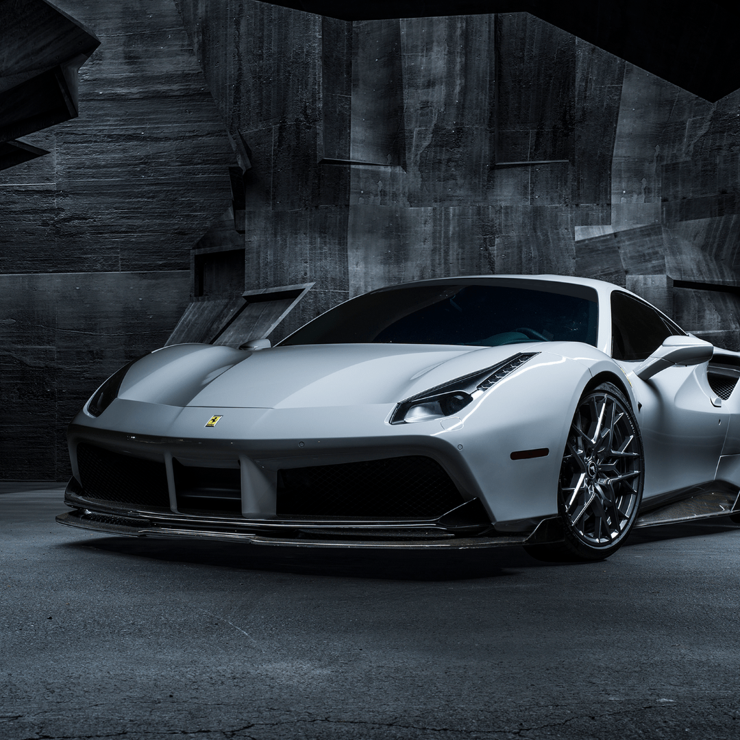 White 488 Diavolo front spoiler, dark studio 3/4 view