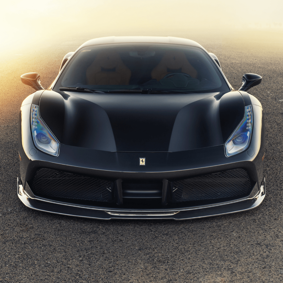Black 488 with Diavolo front spoiler, head-on outdoor view