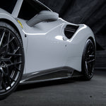 Carbon Diavolo side skirt on white Ferrari 488, dark studio 3/4 view
