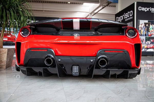 wide view of Capristo Carbon Fiber Rear Diffuser (Matte) for Ferrari 488 Pista 2018-2020 fitted inside a red car